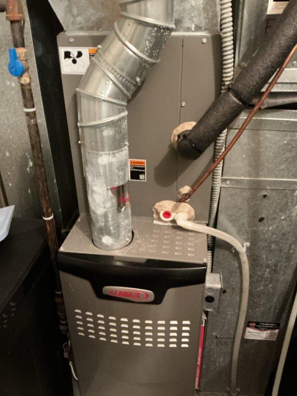Completed Family Rewards cooling maintenance visit on 4-year-old heat pump system. Performed comprehensive AC tune-up including condenser coil rinse and system performance verification. Measured operating temperatures and confirmed proper system operation of Lennox equipment.