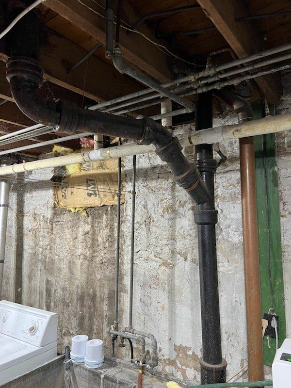 Responded to a completely clogged bathroom sink drain in an older home with a history of slow drainage and suspected cast iron pipe corrosion. Removed the existing P-trap assembly, which sustained damage during removal and required replacement. Cabled the drain line to its full accessible length using a drain snake to clear the blockage within the branch line. Successfully opened the drain and restored proper flow, though no debris was retrieved on the cable. Installed a new P-trap assembly and tested the system for proper drainage and leak-free operation, confirming full functionality upon completion.