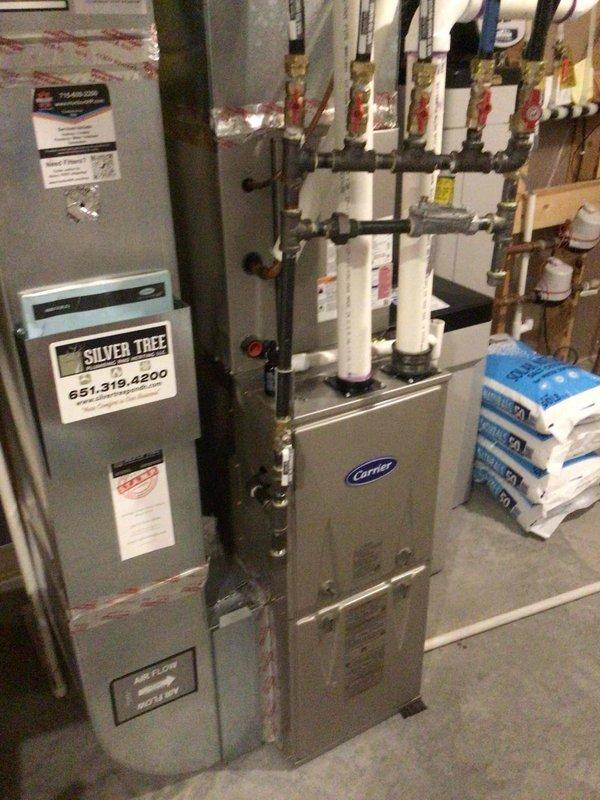 Completed comprehensive AC tune-up on 6-year-old Carrier system. Performed outdoor unit cleaning, verified all electrical components within manufacturer specifications, replaced air filter, and confirmed proper system operation with satisfactory temperature differential across the evaporator coil.