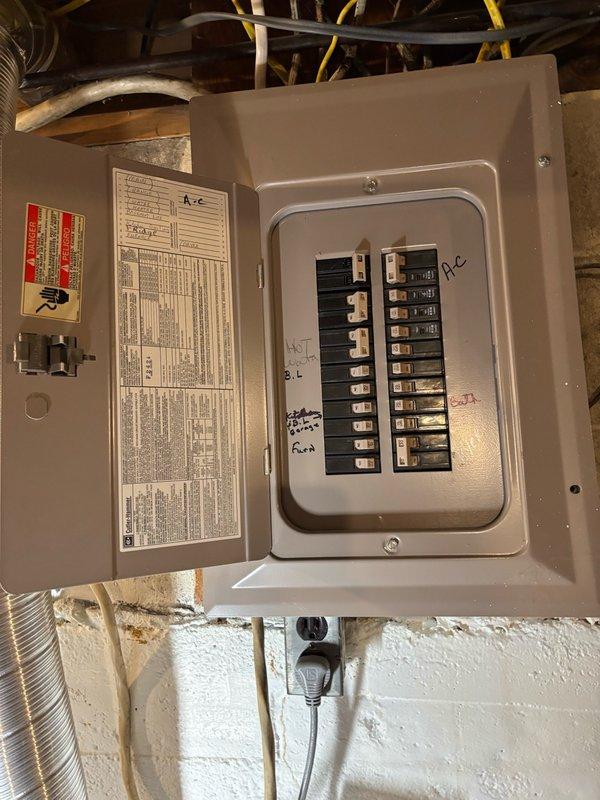 Completed annual air conditioning tune-up on 7-year-old Goodman system as part of membership maintenance agreement. Performed comprehensive inspection of outdoor condenser unit including coil cleaning with specialized brush and foaming solution to remove accumulated debris and improve heat transfer efficiency. Verified electrical connections at main breaker panel, confirmed proper circuit protection, and ensured all system components were functioning within normal operating parameters. System tested and found to be running properly with no deficiencies identified.