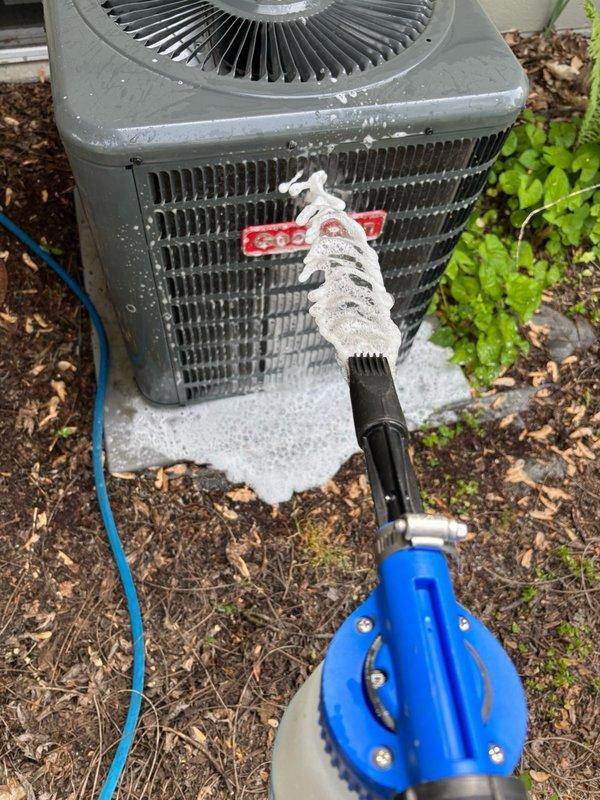 Completed annual air conditioning tune-up on 7-year-old Goodman system as part of membership maintenance agreement. Performed comprehensive inspection of outdoor condenser unit including coil cleaning with specialized brush and foaming solution to remove accumulated debris and improve heat transfer efficiency. Verified electrical connections at main breaker panel, confirmed proper circuit protection, and ensured all system components were functioning within normal operating parameters. System tested and found to be running properly with no deficiencies identified.