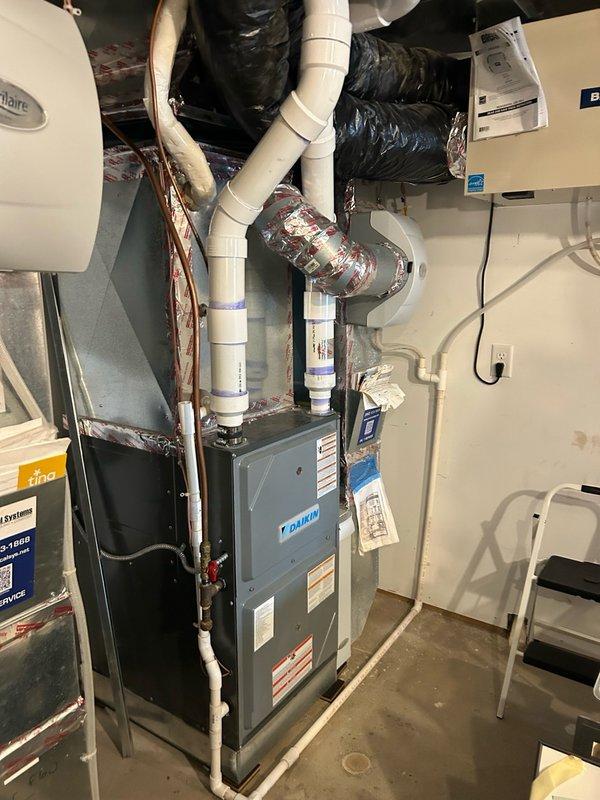 Responded to a no cool call and performed system inspection. Found the outdoor condenser coils heavily impacted with dirt and debris, preventing proper unit operation. Thoroughly cleaned the condenser coils to restore adequate airflow and heat transfer. Upon arrival, property was reported to have 2 thermostats and 2 zones; however, inspection revealed the system actually consists of 4 thermostats controlling 4 separate zones. 

Performed comprehensive system diagnostics including refrigerant pressure readings, capacitor testing, and contactor inspection. All electrical components and refrigerant levels were found to be operating within manufacturer specifications. Reset the system and cycled through all four zones to verify proper operation of each thermostat and corresponding zone. All zones responded correctly and achieved proper cooling.

Confirmed air filters had been recently replaced and provided maintenance recommendation to continue filter replacement every 3 months to prevent 