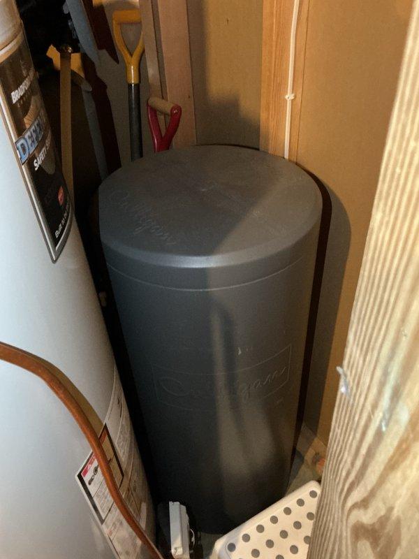 Performed comprehensive AC maintenance tune-up on communicating system, verifying air filter condition, blower speeds, and evaporator coil drainage. Inspected all electrical components, tightened and verified wiring connections at outdoor unit to address intermittent communication error, performed system reset, and cleaned condenser coils. System operational with proper 22-degree temperature split across evaporator coil.