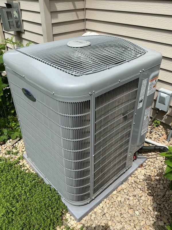 Performed comprehensive AC maintenance tune-up on communicating system, verifying air filter condition, blower speeds, and evaporator coil drainage. Inspected all electrical components, tightened and verified wiring connections at outdoor unit to address intermittent communication error, performed system reset, and cleaned condenser coils. System operational with proper 22-degree temperature split across evaporator coil.