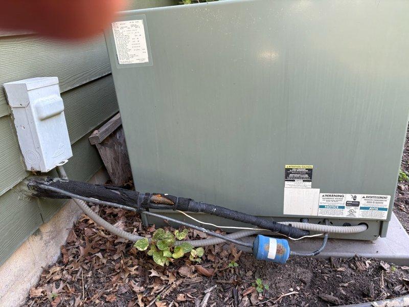 Responded to no cooling complaint on 15-year-old Ruud air conditioning system. Diagnosed system low on refrigerant with active leak present. Measured temperature split at 16 degrees across coil, indicating inadequate cooling capacity. Evaporator coil temperature reading of 34 degrees approaching freezing point due to low refrigerant charge. Verified air filter clean, evaporator coil clean, and blower operating at correct fan speed. Discussed repair and replacement options with homeowner and provided written estimates via email. Scheduled follow-up appointment with service advisor to finalize solution.