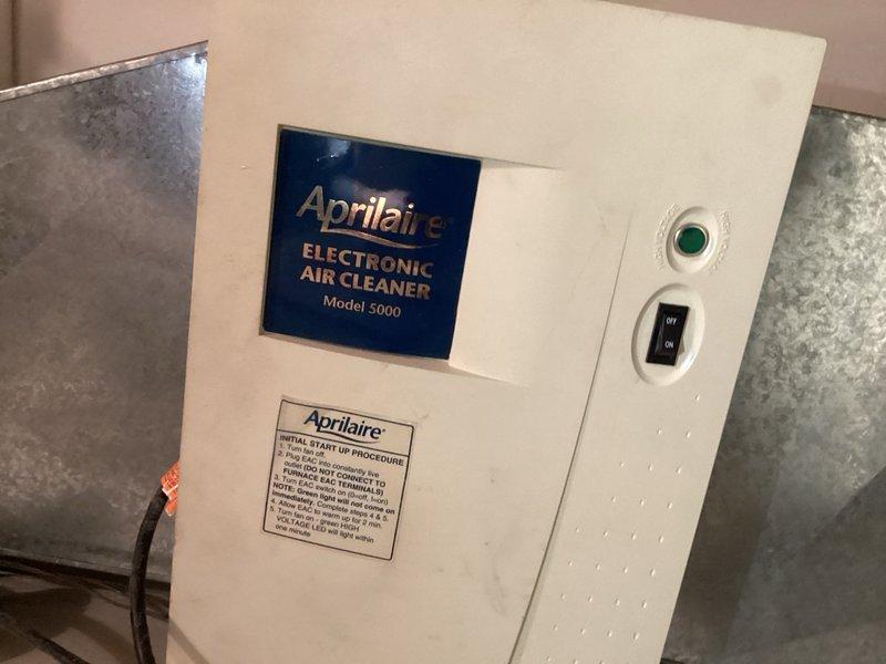 Completed annual cooling system maintenance per membership agreement. Inspected and serviced Lennox outdoor condensing unit, including cleaning of condenser coil and top grille, verification of refrigerant pressures, and operational testing of all components. Inspected Aprilaire Model 5000 electronic air cleaner and furnace filter media, noting significant debris accumulation requiring replacement. All equipment operational upon completion of tuneup service.