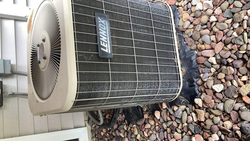 Completed annual cooling system maintenance per membership agreement. Inspected and serviced Lennox outdoor condensing unit, including cleaning of condenser coil and top grille, verification of refrigerant pressures, and operational testing of all components. Inspected Aprilaire Model 5000 electronic air cleaner and furnace filter media, noting significant debris accumulation requiring replacement. All equipment operational upon completion of tuneup service.