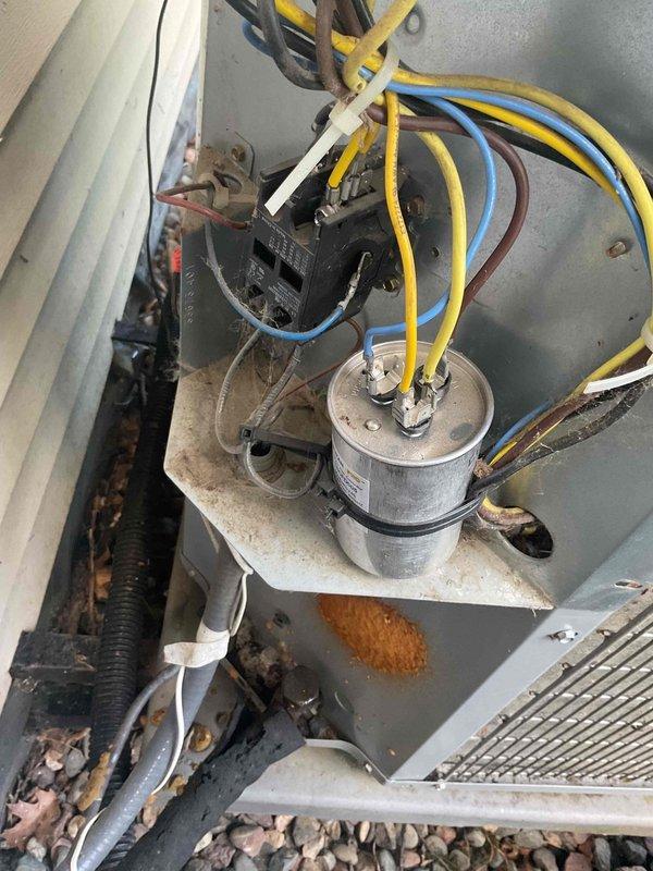 Completed scheduled AC tune-up and preventive maintenance on residential air conditioning system. Performed comprehensive electrical diagnostics using multimeter to verify capacitor function and electrical connections, inspected condenser unit components including capacitor mounting and wire terminals, and replaced air filter per maintenance agreement protocol. All electrical readings confirmed within normal operating parameters, system tested and left in proper working condition.