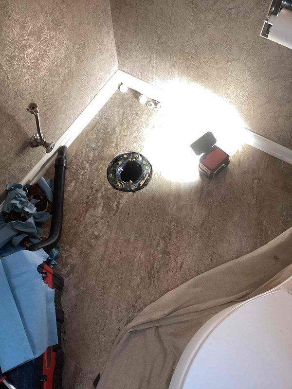 Responded to reported toilet leak following recent installation. Upon inspection, identified failed wax ring with horn as source of water seepage at base of toilet. Removed toilet, cleaned flange and mounting surface, and reinstalled toilet using new wax ring without horn to ensure proper seal and prevent future leakage.