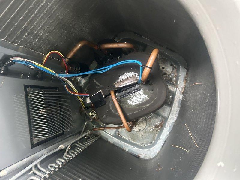 Completed annual air conditioning maintenance on 3-ton system per maintenance agreement. Tested unit operation and confirmed proper airflow with 20° temperature differential across coil. Verified air filter condition, cleared condensate drain line, and pressure-washed outdoor condenser coil. Inspected all electrical connections and mechanical components. Discovered significant accumulation of animal nesting material (straw/grass debris) around blower motor assembly and refrigerant lines inside air handler cabinet. System operating within normal parameters upon completion of service.