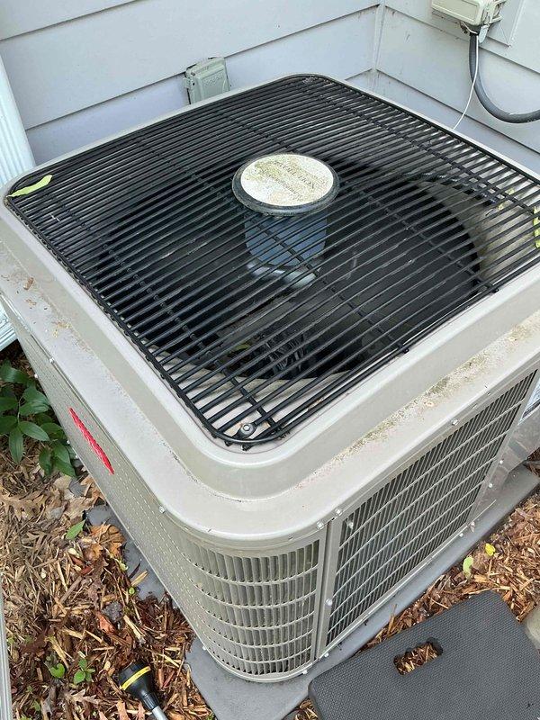 Completed annual cooling system maintenance inspection on 7-year-old air conditioning unit as part of preventive maintenance agreement. System found fully operational with no issues identified during comprehensive tune-up. Installed locking cap on outdoor condenser unit to secure equipment.