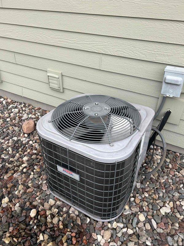 Completed preventative maintenance tune-up on 13-year-old front residential air conditioning system under recurring maintenance agreement. Performed comprehensive cooling system inspection including all major components, verified proper operation with measured 20° temperature split across evaporator coil, and confirmed equipment is functioning within manufacturer specifications with no deficiencies noted.