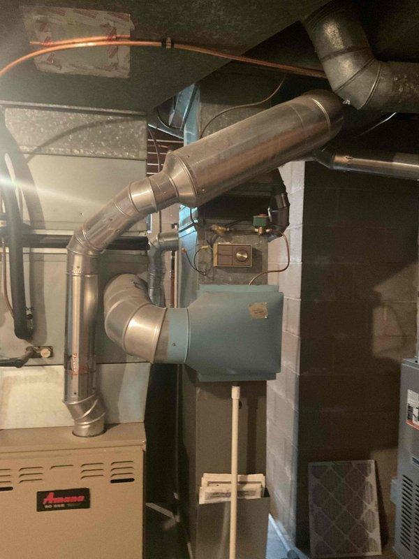 Responded to no cooling complaint and found system low on refrigerant with failed compressor. Performed insulation resistance test on compressor which confirmed electrical failure. Also discovered blown fuses in disconnect. Due to age and condition of equipment with multiple failed components, recommended and completed full system replacement of outdoor condensing unit.