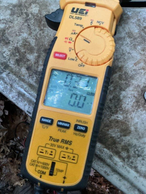Completed preventive maintenance inspection on 22-year-old R410A air conditioning system as part of routine cooling season tune-up. Performed comprehensive system evaluation including electrical measurements, refrigerant analysis, and component inspection. Identified pitted contactor requiring attention and noted aging thermostat. All electrical readings documented using digital multimeter, with amperage and voltage measurements recorded to verify proper system operation. System operational at time of departure with recommendations provided for component upgrades to ensure continued reliability.