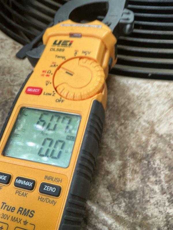 Completed preventive maintenance inspection on 22-year-old R410A air conditioning system as part of routine cooling season tune-up. Performed comprehensive system evaluation including electrical measurements, refrigerant analysis, and component inspection. Identified pitted contactor requiring attention and noted aging thermostat. All electrical readings documented using digital multimeter, with amperage and voltage measurements recorded to verify proper system operation. System operational at time of departure with recommendations provided for component upgrades to ensure continued reliability.