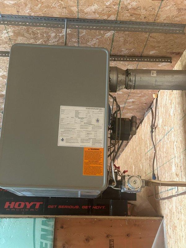 Responded to no-heat call for garage heater. Found pilot light would ignite but gas valve failed to open despite receiving proper 24-volt signal. Diagnosed faulty standing pilot gas valve preventing main burner operation. Provided estimate for gas valve replacement on Modine unit.
