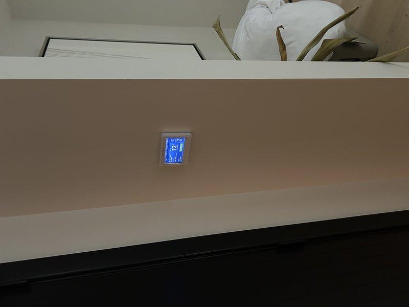 Responded to no cooling complaint on 4-year-old air conditioning system. Found blown low-voltage fuse at furnace control board. Performed comprehensive system diagnostics and discovered resistance to ground on air conditioner contactor circuit. Traced thermostat wiring from outdoor unit back to furnace, inspecting all connections and wire routing through metal straps. Identified multiple contributing factors: conflicting thermostat settings between zones (heat mode in one area, cool mode in another) and exposed thermostat wire on exterior that was repaired with electrical tape. Isolated and tested contactor independently to rule out component failure. After addressing wiring issues and repairing exposed conductor, retested circuit and confirmed no resistance to ground. Replaced low-voltage fuse, reconnected all components, and verified system operation. Unit cycled properly and restored cooling function.