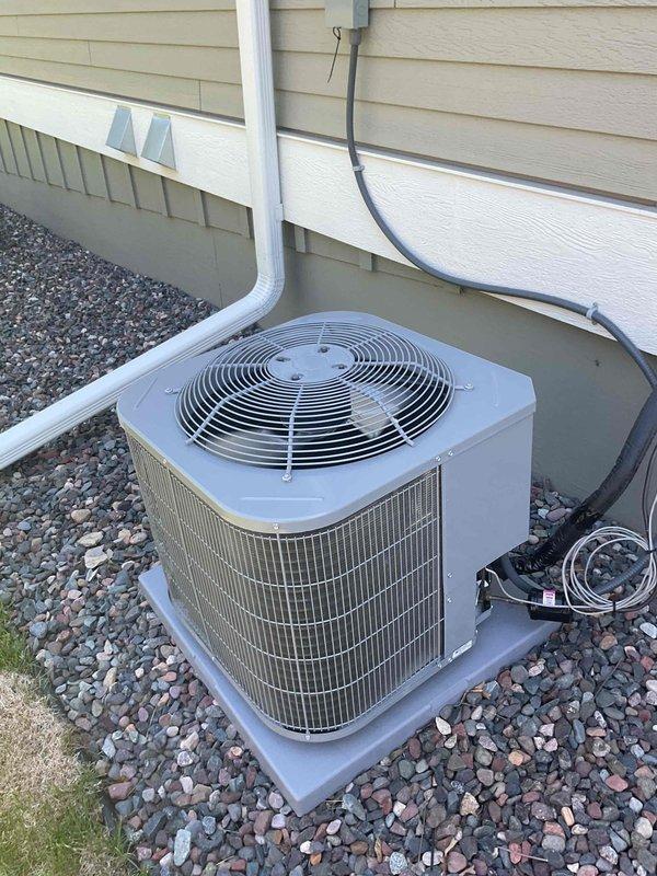 Completed annual air conditioning tune-up on brand new outdoor condenser unit. Inspected all system components, measured refrigerant pressures and temperatures using digital manifold gauges, and verified proper system operation. Replaced dirty air filter to restore optimal airflow and system efficiency.