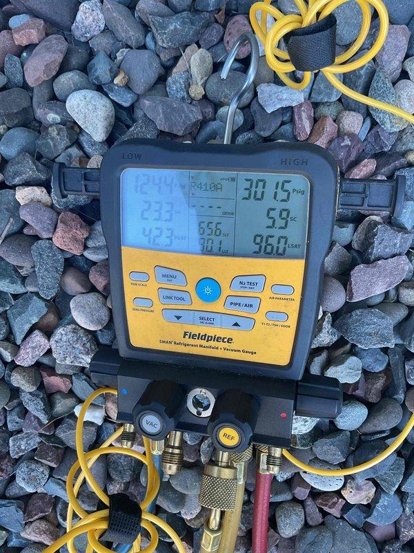 Completed annual air conditioning tune-up on brand new outdoor condenser unit. Inspected all system components, measured refrigerant pressures and temperatures using digital manifold gauges, and verified proper system operation. Replaced dirty air filter to restore optimal airflow and system efficiency.