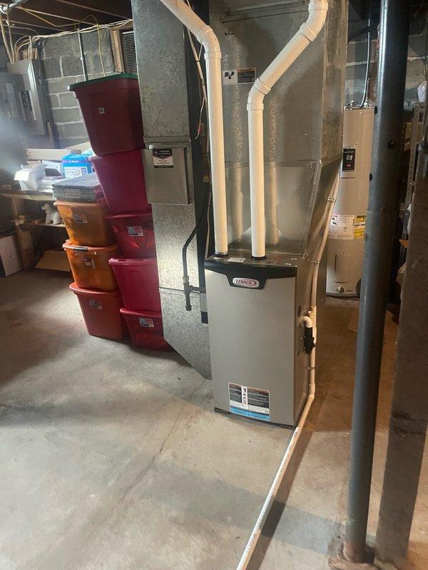 Responded to no cooling call on 4-5 year old air conditioning system. Found outdoor disconnect switch installed upside down, preventing unit operation. Corrected disconnect orientation and performed complete system service to restore cooling functionality.