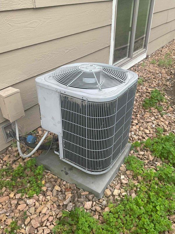 Responded to no cooling complaint on 2009 Lennox system. Upon arrival, customer had already replaced filter and cleaned condenser coils. Performed diagnostic evaluation of both indoor furnace unit and outdoor condensing unit. System operational with no fault codes present, no refrigerant freeze-up observed on coil, and all components functioning within normal parameters at time of inspection. No repairs required.