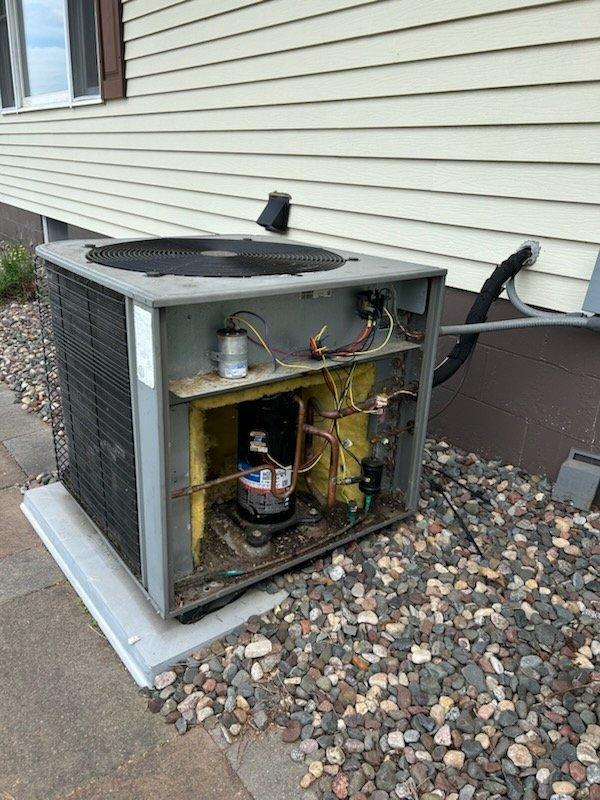 # No Cool Service Call - Lennox Air Conditioning Unit

Responded to a no cooling complaint on a 20-year-old Lennox air conditioning system. Upon arrival, confirmed the outdoor condensing unit was running but the system was not producing adequate cooling. 

Performed diagnostic testing and identified a failed high pressure safety switch preventing normal system operation. The high pressure switch is a critical safety component designed to protect the compressor from operating under excessive refrigerant pressure conditions, which can occur due to restricted airflow, overcharge, or system restrictions.

After diagnosing the faulty high pressure switch, temporarily bypassed the defective safety control to restore cooling function to the residence. Documented the equipment's age at approximately 20 years old, well beyond the typical 10-15 year service life expectancy for residential air conditioning equipment.

Provided comprehensive replacement estimates for a new air conditioning system,