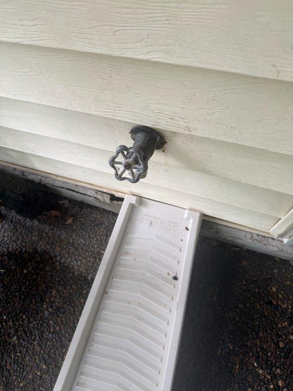 Responded to leaking outdoor spigot that homeowner had attempted to replace but was unable to remove. Accessed the 6-inch soldered spigot and elbow connection through the basement wall, removed the defective fixture, and ordered a new frost-proof spigot for installation to resolve the leak and restore proper outdoor water access.