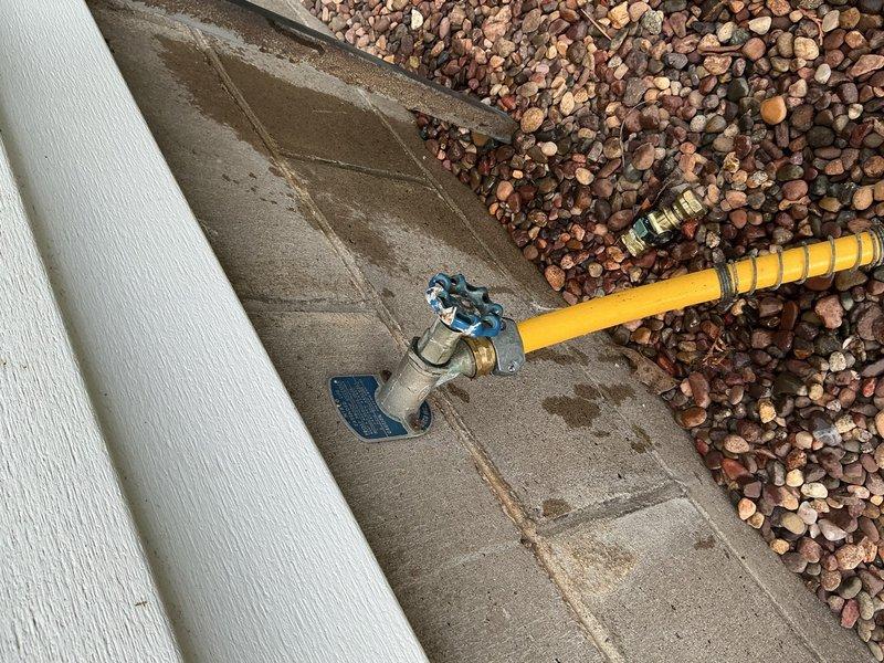 Responded to service call for two leaking outdoor faucets. Inspected first hose bib and determined antisiphon backflow preventer cap required replacement; provided homeowner with ordering information for Nibco-compatible replacement part for customer installation. Evaluated second leaking hose bib located in basement behind stored materials and determined complete fixture replacement necessary; homeowner opted to attempt self-repair with option to schedule follow-up service if needed.