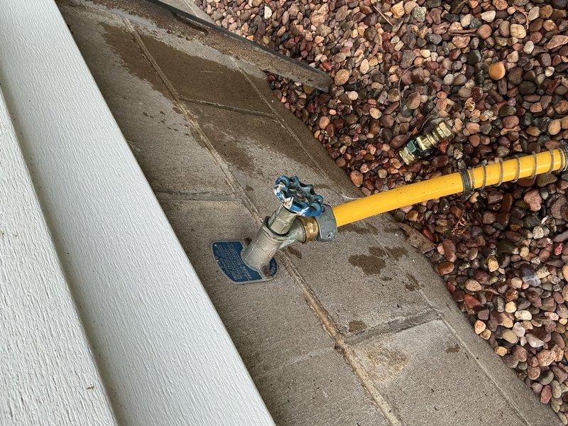 Responded to service call for two leaking outdoor faucets. Inspected first hose bib and determined antisiphon backflow preventer cap required replacement; provided homeowner with ordering information for Nibco-compatible replacement part for customer installation. Evaluated second leaking hose bib located in basement behind stored materials and determined complete fixture replacement necessary; homeowner opted to attempt self-repair with option to schedule follow-up service if needed.
