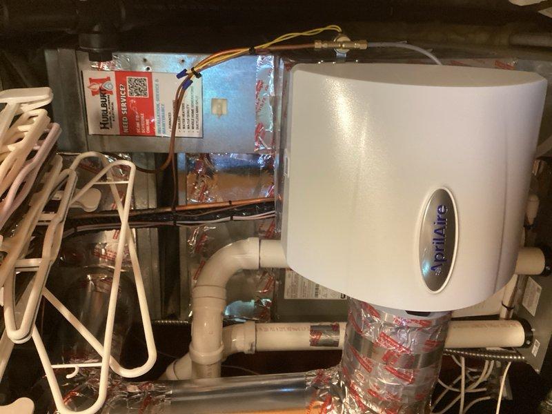 Responded to fourth callback on recently installed Lennox system experiencing recurring no cool condition and coil freezing. Upon arrival, thermostat displayed 77°F current temperature with setpoint at 72°F in cooling mode. Performed comprehensive system diagnostics including furnace blower operation, evaporator coil inspection, heat pump components, sensors, and compressor functionality. 

Identified system overcharge as primary issue contributing to freezing condition. Recovered refrigerant and weighed charge against manufacturer specifications. Removed 4 lbs of excess refrigerant from system. Recalculated and set proper subcooling per equipment requirements. Verified proper system operation after refrigerant adjustment.

Previous visit had addressed airflow restrictions by opening vents on main and upper levels, replacing high MERV-rated filter with MERV 8 to reduce static pressure. Note that existing ductwork sizing is undersized for new high-efficiency system compared to previous 