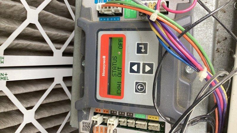 Responded to no cooling complaint on two Carrier RTU units. Upon inspection, found both units displaying economizer alarms and unable to enter cooling mode. Discovered outdoor air sensor wiring disconnected on both units. Reconnected the sensor wiring and cleared alarm codes. During system diagnostics, determined that the units require CO2 sensors to be installed for proper compressor operation in cooling mode. The equipment is configured to prevent cooling cycle without functional CO2 sensor input as part of the economizer control strategy. Verified all other system components operational. Documented control board wiring configurations and economizer module settings. Requested two CO2 sensors for installation to restore full cooling functionality to both rooftop units.