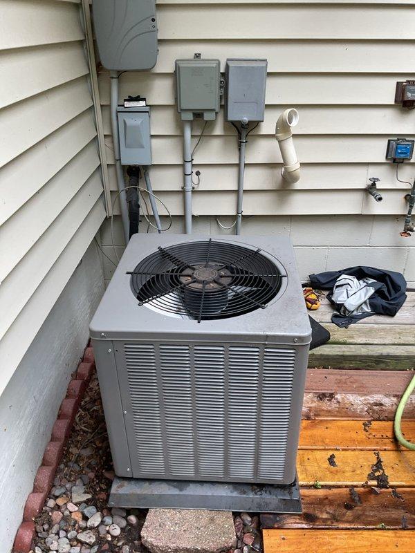 Responded to no cooling complaint on 21-year-old Tempstar split system with outdoor condensing unit. Upon arrival, confirmed system inoperative with indoor temperature at 80°F. Performed diagnostic evaluation and identified failed capacitor as root cause of system failure. Replaced defective capacitor and restored system to operational status. Due to advanced age of equipment, provided pricing options for complete system replacement as requested by homeowner.