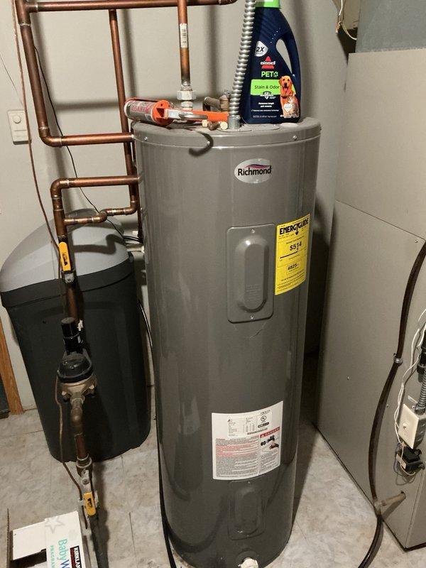 Completed comprehensive BOGO tune-up on 20-year-old air conditioning and furnace systems. For the AC unit, performed electrical inspection with capacitor testing within specifications, replaced air filter, verified evaporator coil and condensate drain functionality, and identified system operating slightly low on refrigerant charge; homeowner elected to continue operation until replacement is needed. On the furnace, cleaned flame sensor, verified proper gas pressure settings, inspected heat exchanger with no concerns found, and confirmed unit operating correctly with 50-degree temperature rise across the heat exchanger.