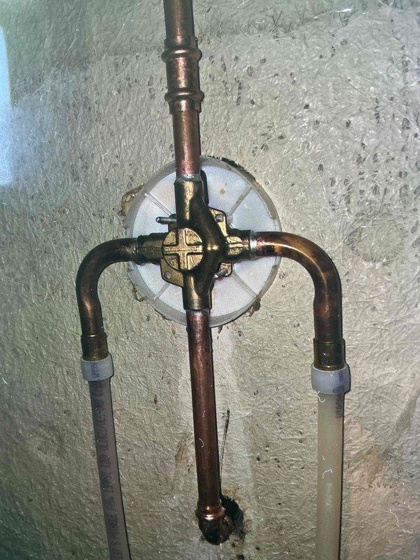 Sold and installed a Moen Chateau Chrome L2353 tub and shower valve system with matching chrome spout and showerhead. The Posi-Temp pressure-balancing valve assembly was mounted to copper supply lines, featuring a single lever handle for temperature control. Return visit scheduled to complete final installation and testing of the shower valve assembly.