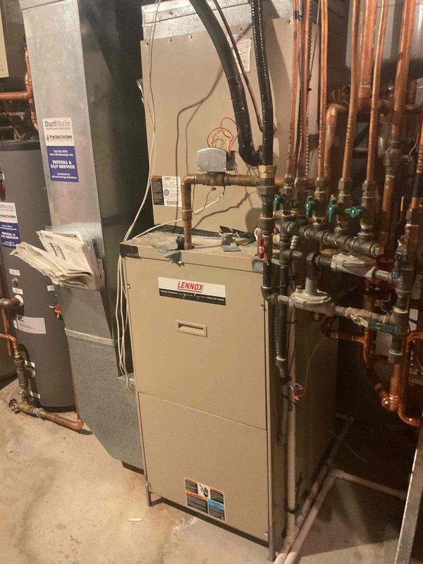 Completed annual cooling system maintenance and tune-up on 23-year-old HVAC system as part of preventative maintenance agreement. Performed comprehensive inspection of outdoor condenser unit and indoor components including basement-mounted blower assembly. System is operating properly with no immediate issues identified, though age of equipment warrants consideration for replacement planning in the near future.