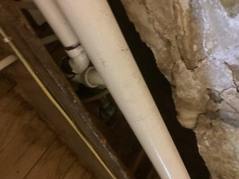 Responded to a tub leaking issue affecting the basement below. Upon inspection, identified a faulty shower valve and compromised tub drain assembly as the sources of water intrusion. Documented existing conditions with photographs of the bathtub fixtures and accessible plumbing in the basement/crawl space area. Provided detailed estimates for complete replacement of the defective shower valve and tub drain to resolve the ongoing leak.