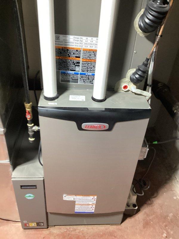 Installed a 40-gallon power vent gas water heater to replace existing unit. Upon inspection, determined original vent pipe was inadequate for standard atmospheric venting, requiring upgrade to power vent model to ensure proper exhaust ventilation and code compliance. Completed installation with appropriate electrical connections and venting configuration in mechanical room adjacent to existing HVAC system.