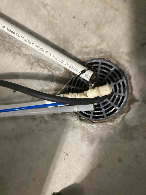 Responded to service call for water pooling around Lennox furnace in basement. Upon inspection, confirmed HVAC system was operating normally for heating and cooling functions. Diagnosed plugged condensate drain line as source of water accumulation on floor. Successfully cleared blockage from drain line and verified proper drainage flow to floor drain. System tested and confirmed draining properly with no further water pooling issues.