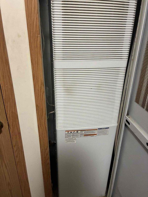 Responded to no cooling complaint at modular home with 26-27 year old R-22 system. Upon arrival, started unit and confirmed all components operational including indoor blower. Connected manifold gauges and found suction pressure critically low at approximately 20 PSI, indicating significant refrigerant loss and system inefficiency. Verified thermostat accuracy and airflow through ductwork. Due to age of equipment, R-22 refrigerant phase-out, and cost-effectiveness considerations, recommended complete air conditioning system replacement rather than repair. Customer approved recommendation and scheduled follow-up consultation for equipment selection and installation.