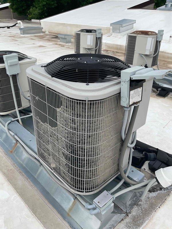 Responded to no cooling complaint on rooftop unit. Upon arrival, confirmed system was running but not providing adequate cooling. Performed diagnostic testing and identified low refrigerant charge as the cause of insufficient cooling. Inspected system components including capacitor and electrical connections, which showed normal wear consistent with unit age. Discussed repair options with customer, noting that refrigerant recharge and replacement costs were comparable due to system condition. Unit assessed and customer provided with recommendations for restoring cooling capacity.