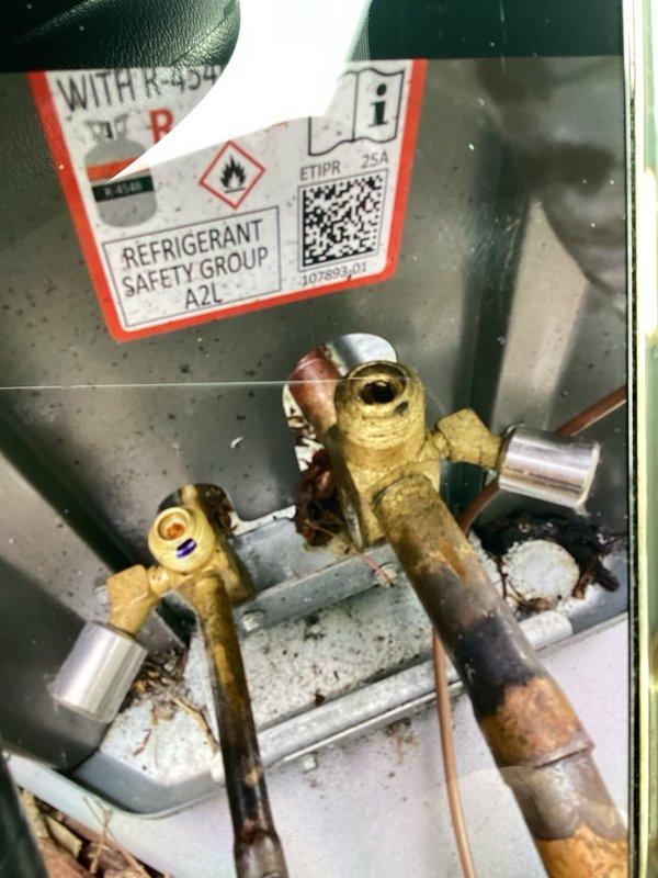 Responded to warranty service call for suspected compressor failure on recently installed unit. Upon inspection, determined the compressor was functioning properly and the issue was caused by a closed suction line service valve. Opened the service valve and verified system operation by measuring refrigerant pressures, subcooling at 7 degrees (meeting target specification), and temperature delta at 19 degrees across the evaporator coil. System restored to proper operation with all parameters within manufacturer specifications.
