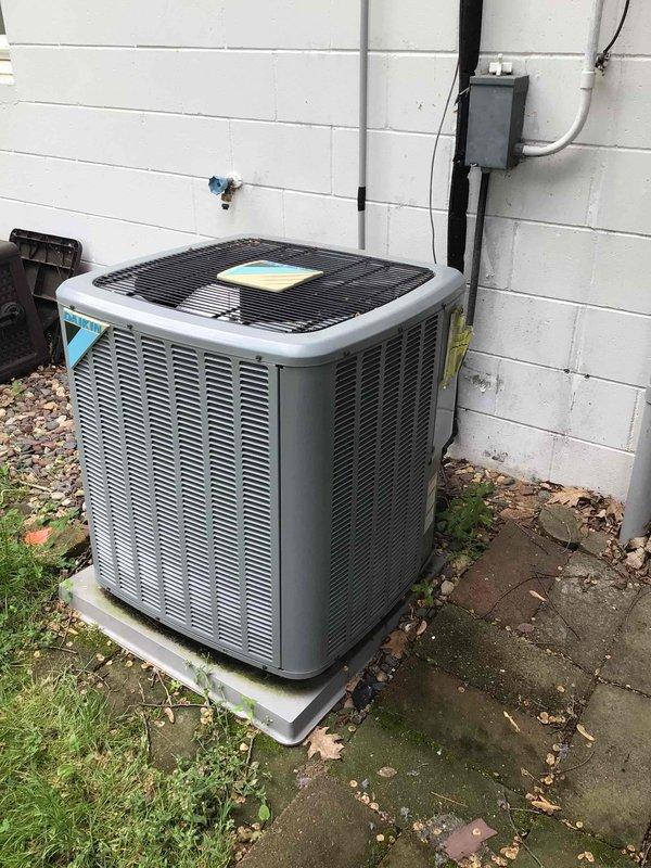 Replaced ECM blower motor module under parts warranty in a confined attic space above the garage. Successfully installed the new blower motor despite challenging accessibility constraints. Performed comprehensive AC tune-up including washing the outdoor condenser unit and conducting complete electrical testing. All electrical measurements verified within manufacturer specifications. System filter was recently replaced by homeowner. Confirmed both blower motor and air conditioning system operating properly upon completion.