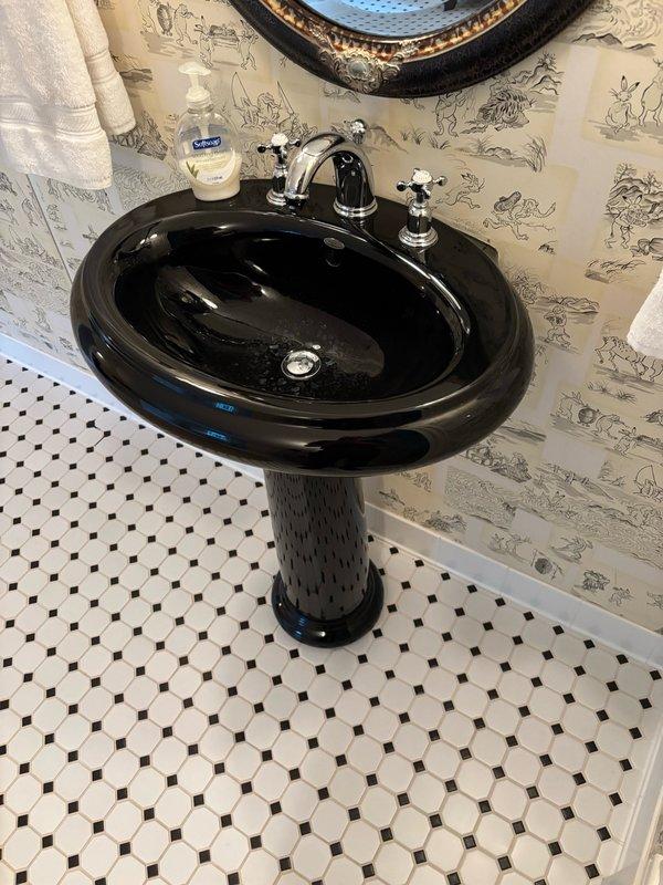 Performed comprehensive plumbing inspection including leak detection in basement utility areas, bathrooms, and kitchen fixtures. Serviced iron filter system by cleaning the air intake to maintain proper function. Identified two toilets with leaking flappers and notified property manager for homeowner follow-up. All other plumbing fixtures and systems inspected and found to be operating within normal parameters.