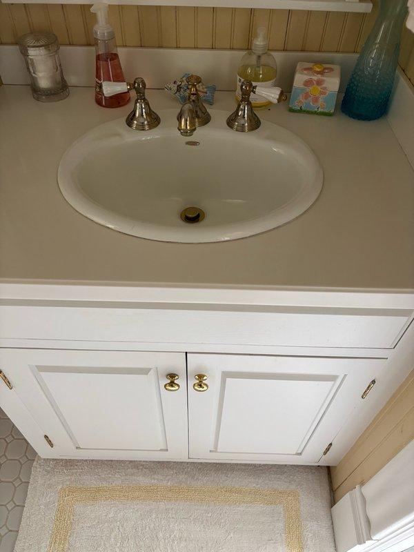 Performed comprehensive plumbing inspection including leak detection in basement utility areas, bathrooms, and kitchen fixtures. Serviced iron filter system by cleaning the air intake to maintain proper function. Identified two toilets with leaking flappers and notified property manager for homeowner follow-up. All other plumbing fixtures and systems inspected and found to be operating within normal parameters.