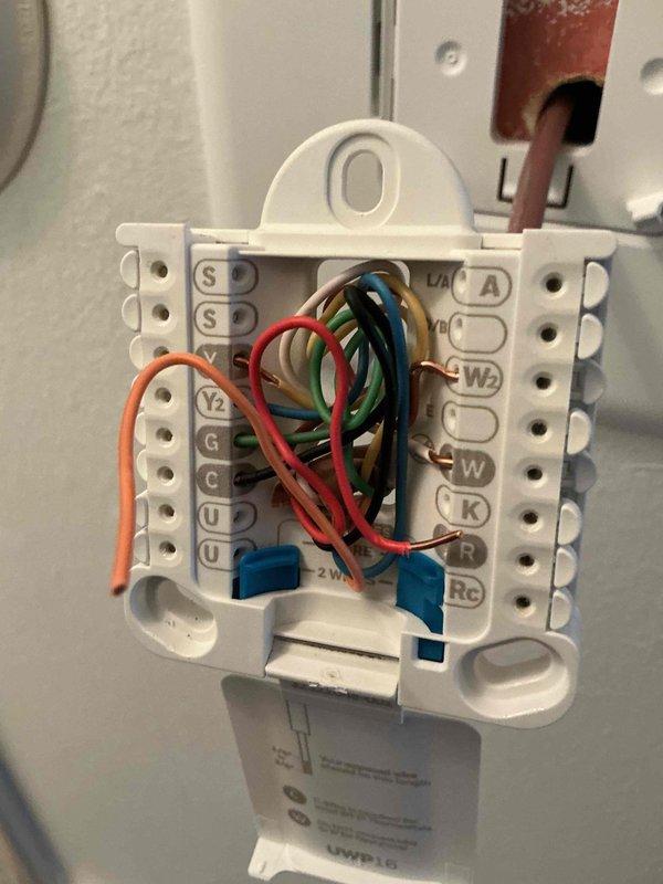 Completed warranty thermostat replacement on HVAC system. Removed old thermostat and installed new unit per manufacturer specifications, connecting all wiring to appropriate terminals on the control board. During installation, identified that the circuit board lacks an O/B terminal, requiring thermostat configuration to be set for conventional heating mode rather than heat pump operation. Verified all electrical connections at terminal blocks, programmed thermostat settings accordingly, and performed operational testing to confirm proper system function.