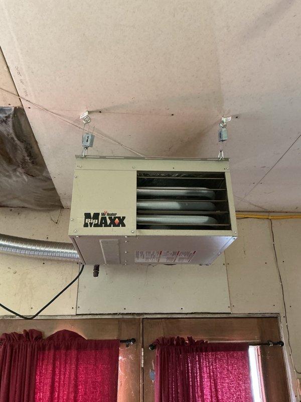 Completed comprehensive AC tune-up on 7-year-old Lennox system, including air filter replacement, evaporator drain verification, and condenser coil inspection. All electrical components tested within specification, unit achieved proper 20-degree temperature split upon startup. Diagnosed failed control board on Big Maxx propane garage heater preventing ignition spark; customer declined repair and requested replacement unit pricing.
