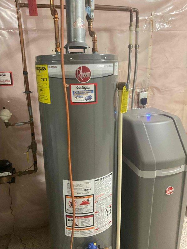 Completed Family Rewards cooling maintenance visit on residential air conditioning system. Performed comprehensive AC tune-up including system inspection and performance verification. Replaced dirty air filter and hung replacement filter for customer convenience. Documented electrical panel configuration and water heating equipment present in mechanical spaces during service visit.
