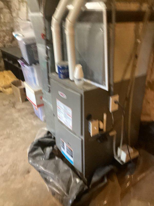 Returned call to address customer questions regarding estimates provided during previous visit. Reviewed proposed work scope and specifications with customer, clarifying details about HVAC furnace system and electrical panel requirements. Documented existing conditions through photography, capturing current furnace installation with PVC exhaust/intake configuration and electrical distribution panel with multiple circuit breakers. Answered all customer inquiries and confirmed customer's intent to proceed with recommended work upon completion of discussion.