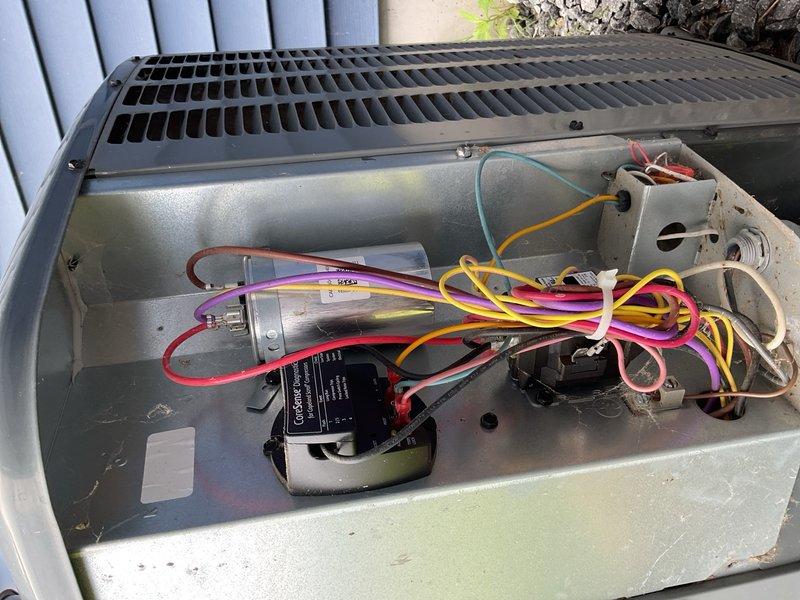 Responded to no cooling complaint with warm air blowing and minimal airflow. Upon arrival, diagnosed compressor clicking sound and identified failed capacitor as primary issue. Performed complete condenser coil cleaning, replaced defective capacitor, installed new air filter, and tested system operation to verify proper cooling restored.