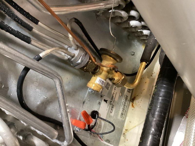 Responded to a no cooling complaint with high indoor humidity levels at 62%. Upon inspection, diagnosed that the heat pump system was not engaging second stage cooling. Investigated the furnace control board and thermostat wiring to identify the Y2 signal failure. Properly connected and secured the Y2 wire terminals at both the heat pump and furnace board to restore two-stage cooling capability. Performed system reset and verified proper operation of both cooling stages. System now cycling correctly and dehumidifying as designed.